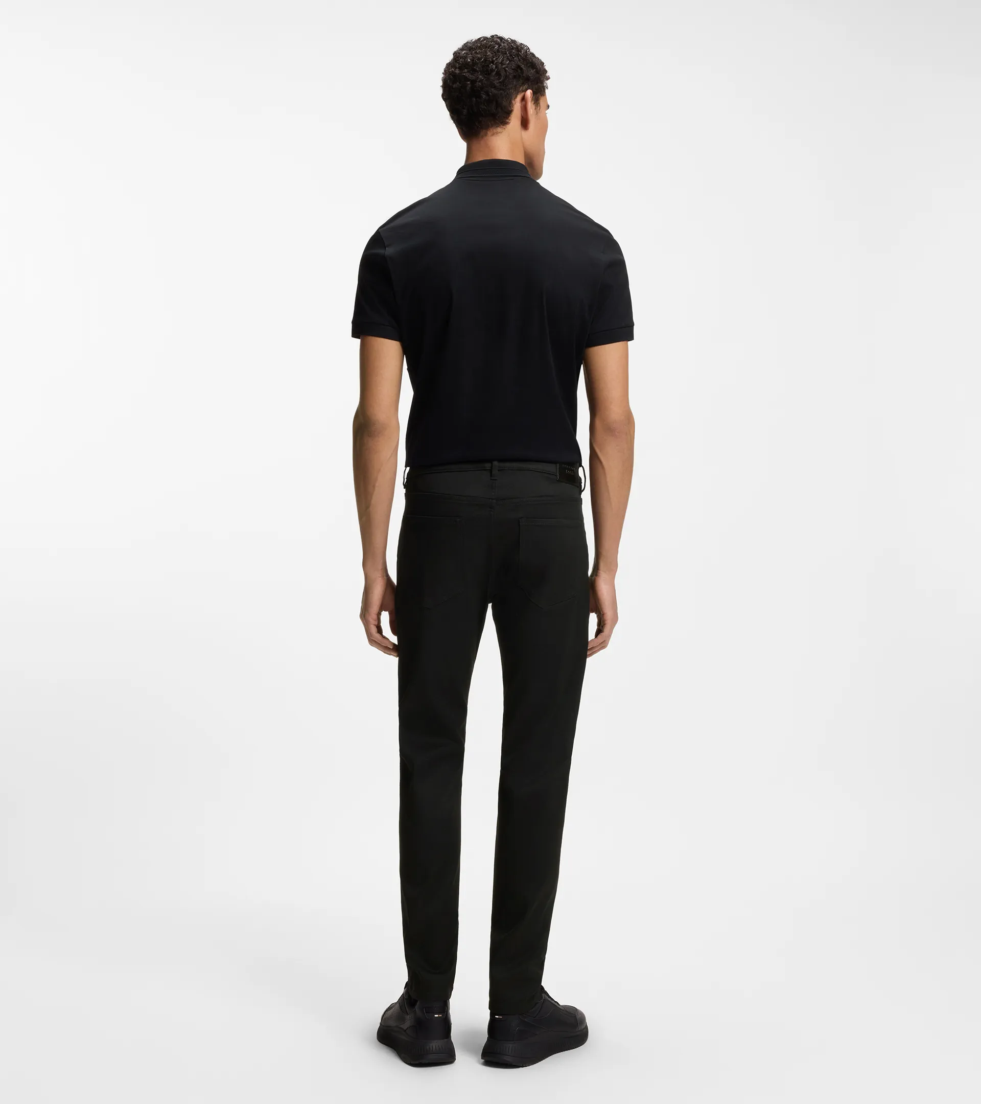 Tapered-fit trousers in stretch denim - Porsche x BOSS | PORSCHE SHOP